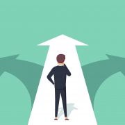 person standing at the edge of three arrows going into three different directions